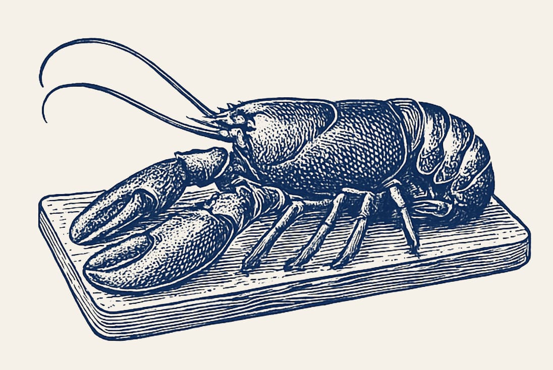 lobsters in a cream cornwall bowl on a table set with Cream Cornwall placemats