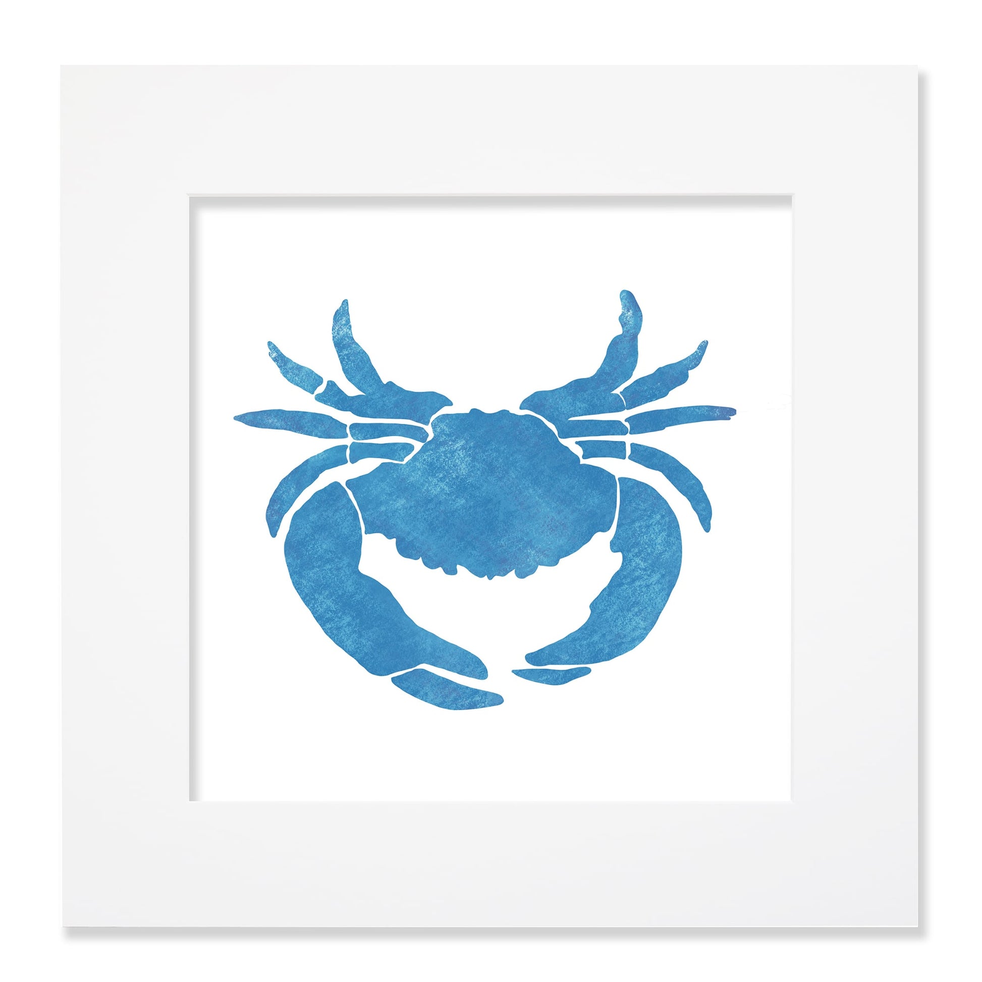 A 40cm square mounted artwork featuring a bold blue crab silhouette with a textured watercolor effect. The crab is centrally positioned against a crisp white background, enclosed within a white mount and frame. The design has a nautical and coastal-inspired aesthetic, making it a stylish piece for ocean-themed decor.