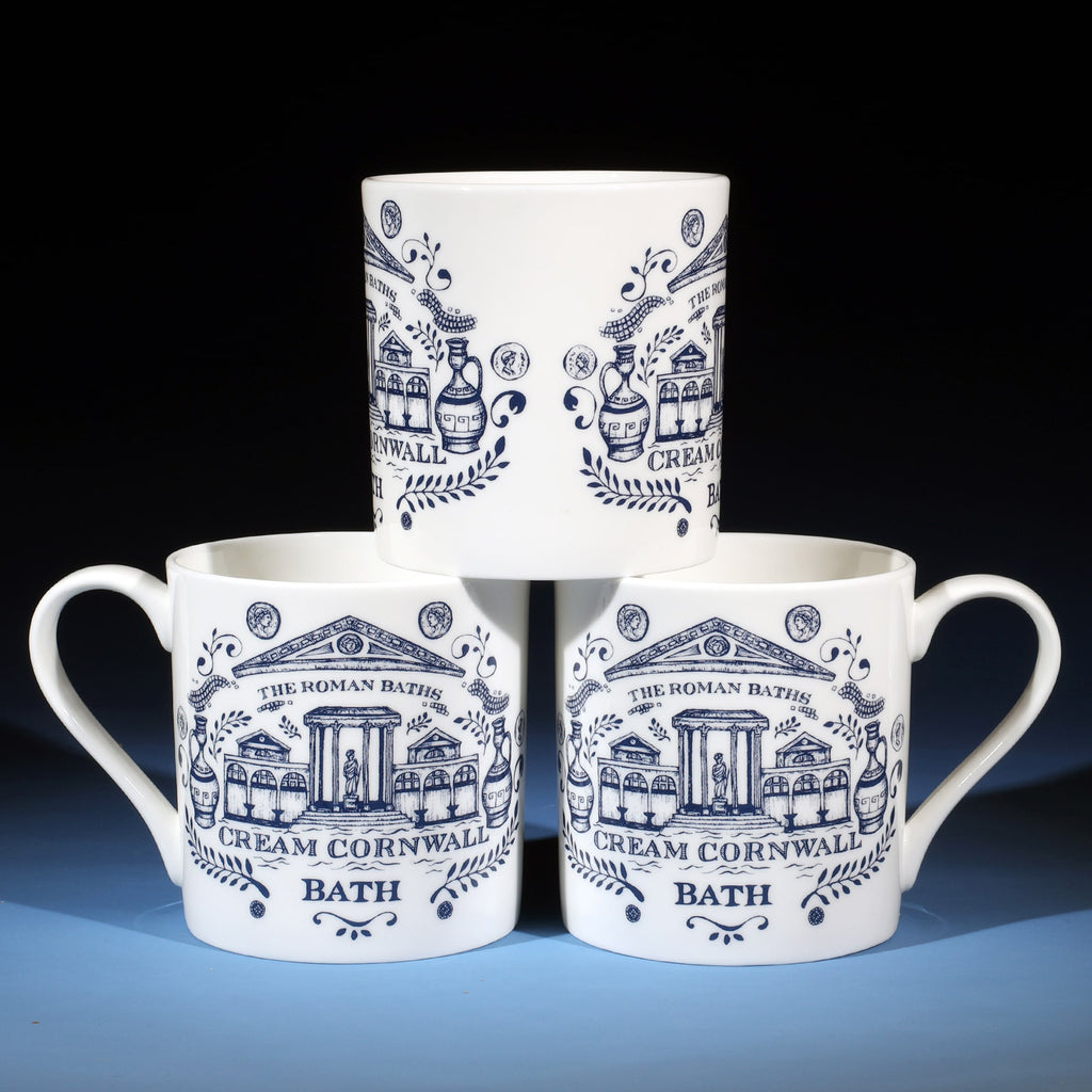 Three Bath mugs on top of each other showing different sides.