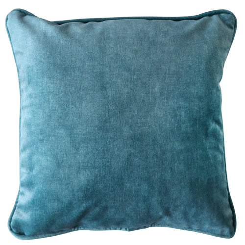 Aqua velvet cushion on white background