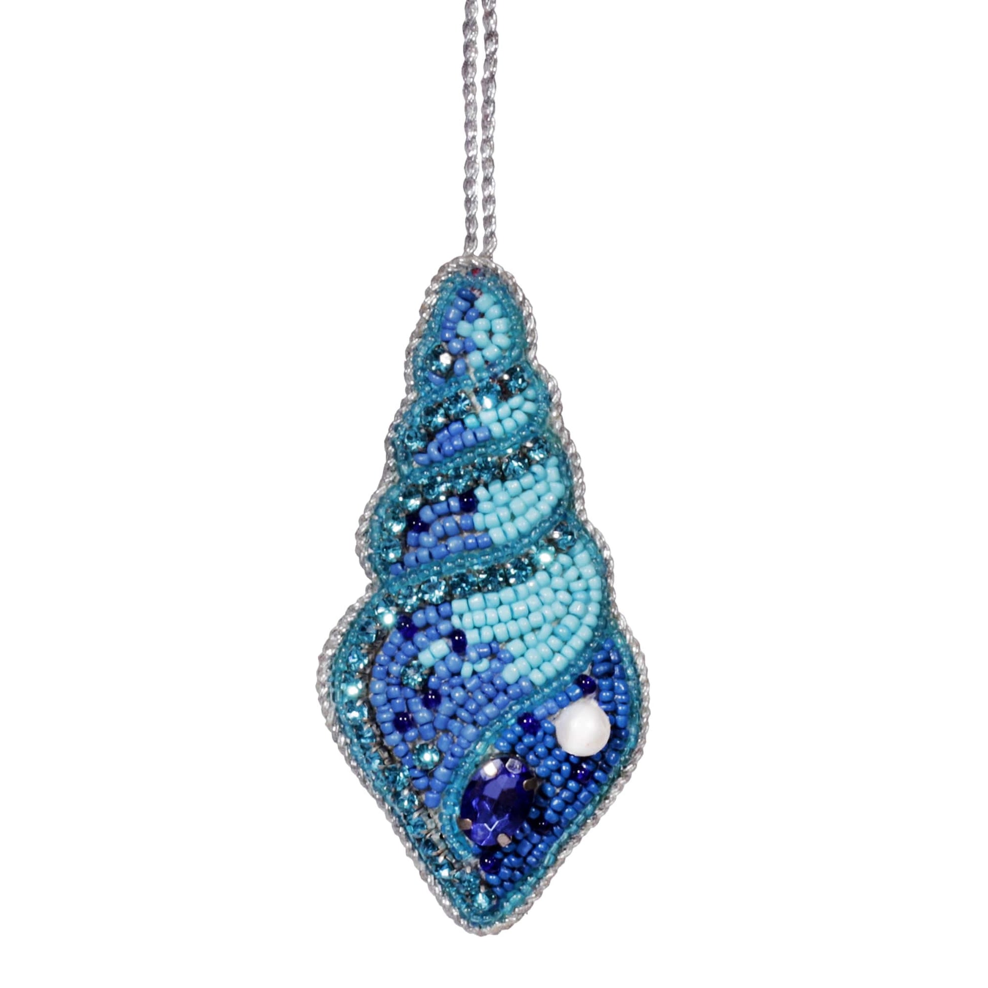 Alt text: Hand-beaded shell ornament featuring intricate blue and turquoise beads with shimmering jewel accents. This coastal-themed decoration captures the serene colors of the ocean, perfect for adding a touch of seaside elegance to home decor or as a unique gift for beach lovers.