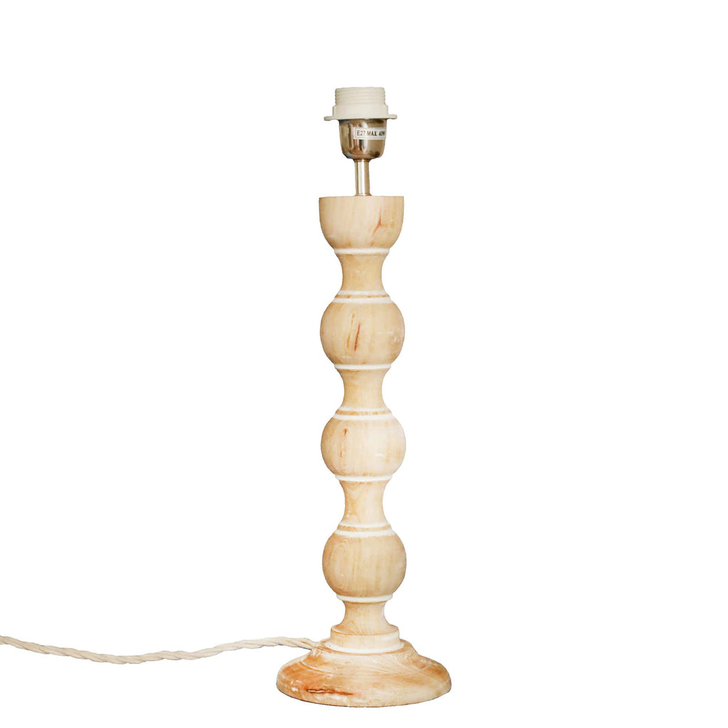 Whitewashed wooden lamp base in large bobbin design with natural coloured flex and chrome & white fittings.