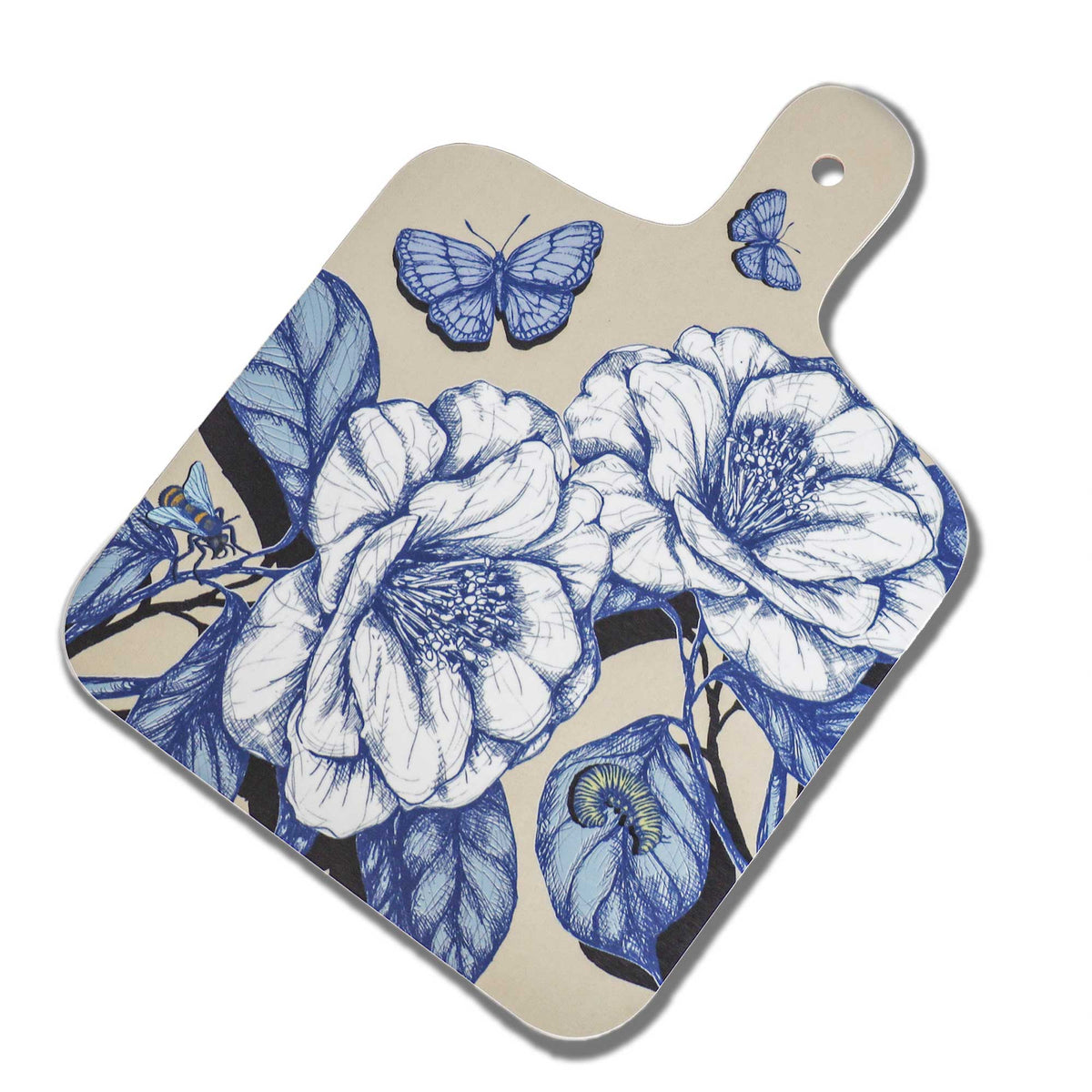 Cream Cornwall floral chopping board featuring intricate blue and white botanical illustrations, delicate butterflies and a bee on a soft cream background. Finished with rounded corners and a handle with a hanging hole.