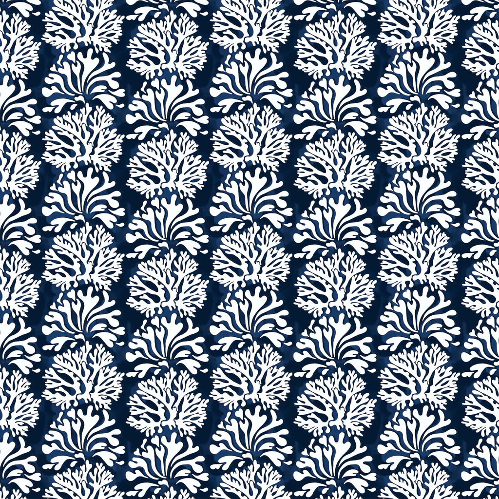 Seamless repeating fabric pattern featuring intricate white coral and seaweed motifs arranged in alternating vertical rows against a deep navy blue background. The design evokes a coastal, underwater theme with a stylized, hand-drawn aesthetic.