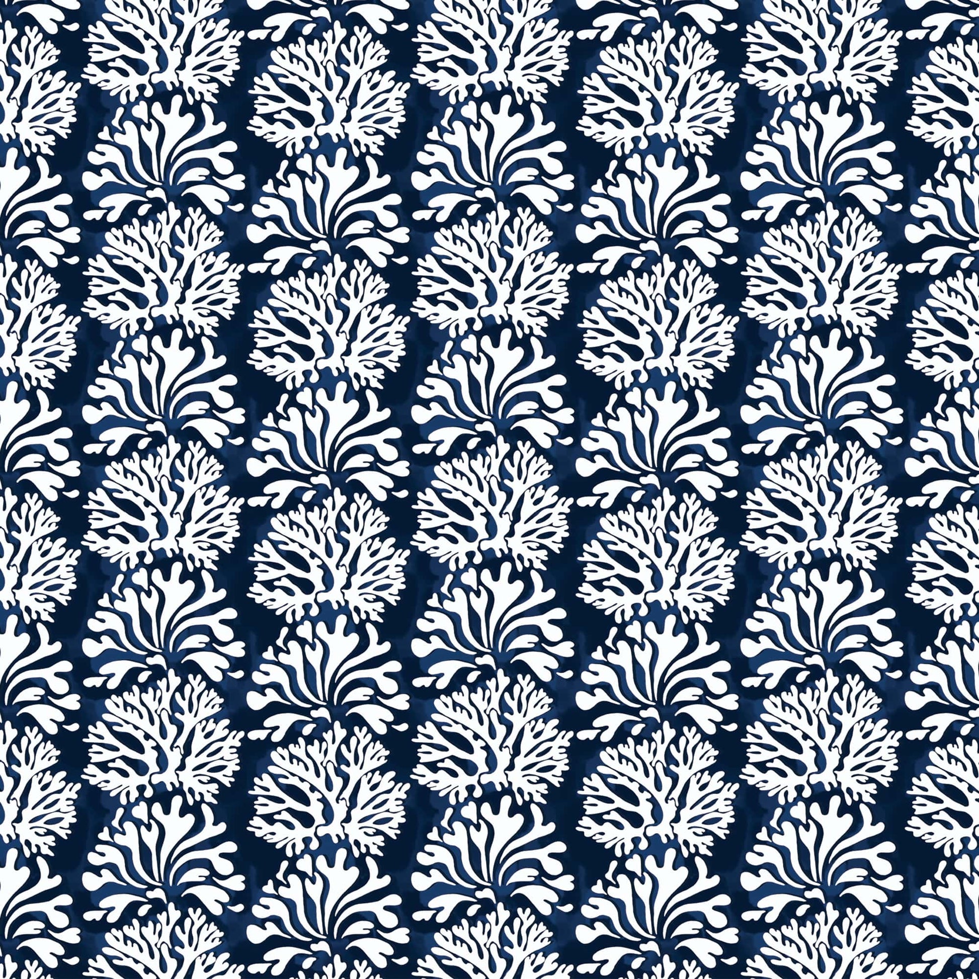 Seamless repeating fabric pattern featuring intricate white coral and seaweed motifs arranged in alternating vertical rows against a deep navy blue background. The design evokes a coastal, underwater theme with a stylized, hand-drawn aesthetic.