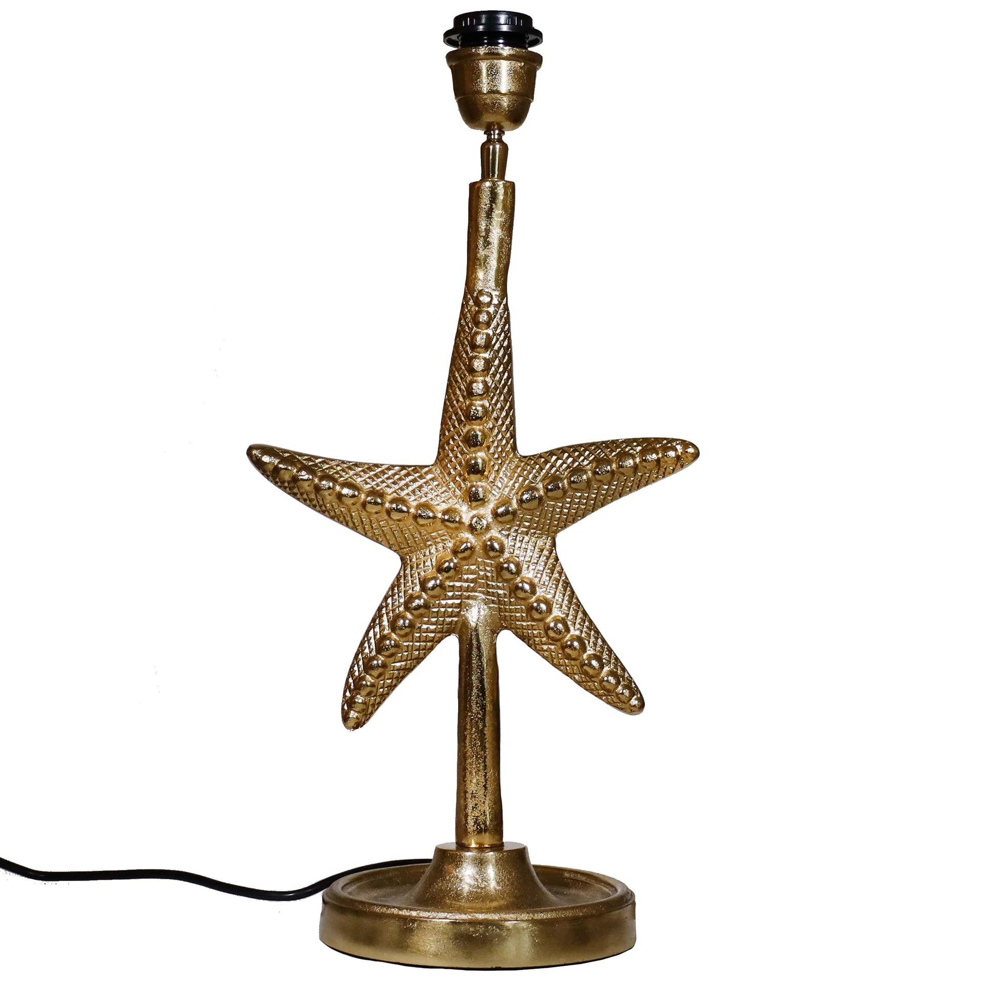 A gold starfish-shaped lamp base with textured detailing and a round pedestal, featuring a black lamp fitting and visible black cord.
