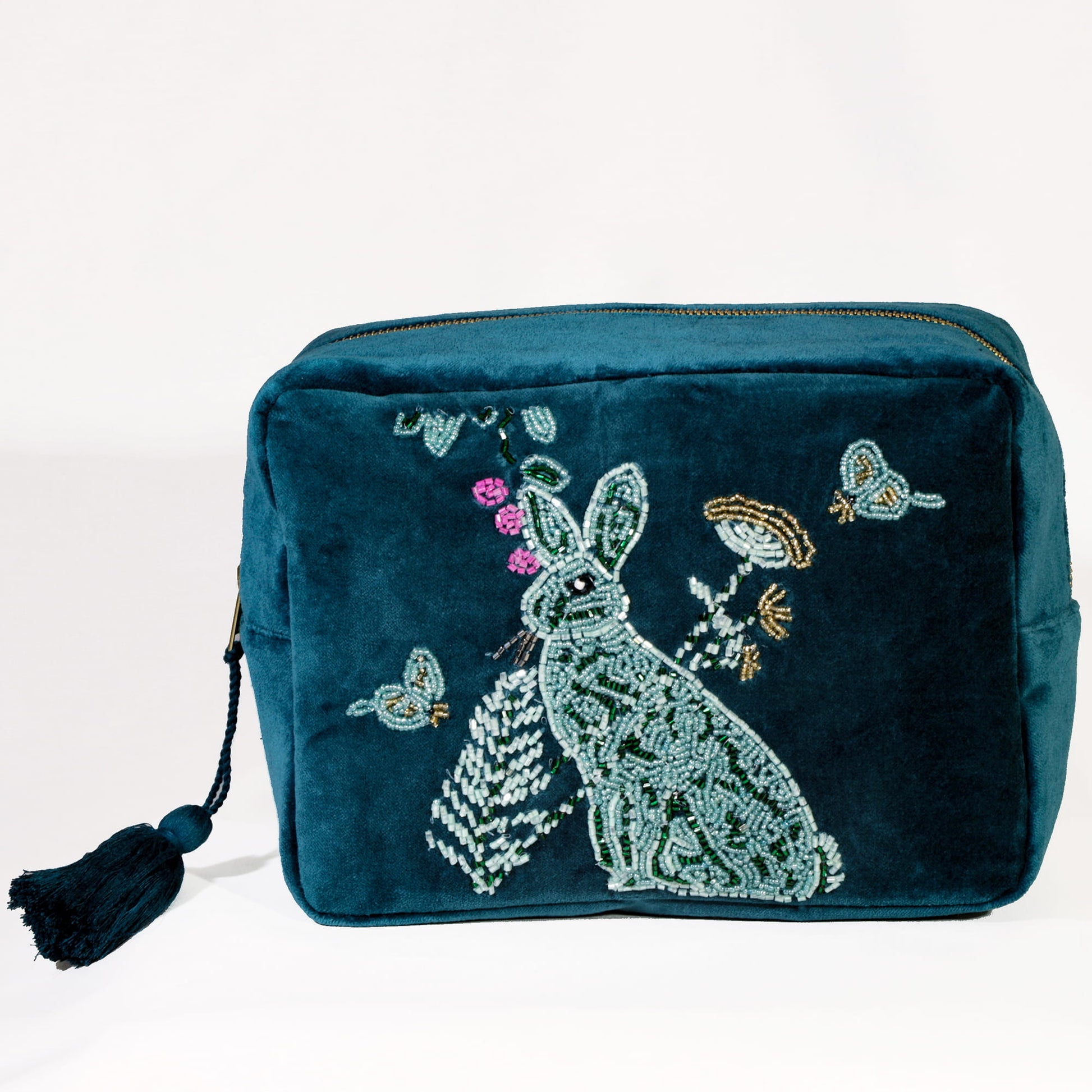 Teal pouch with embroidered hare design on a white background.