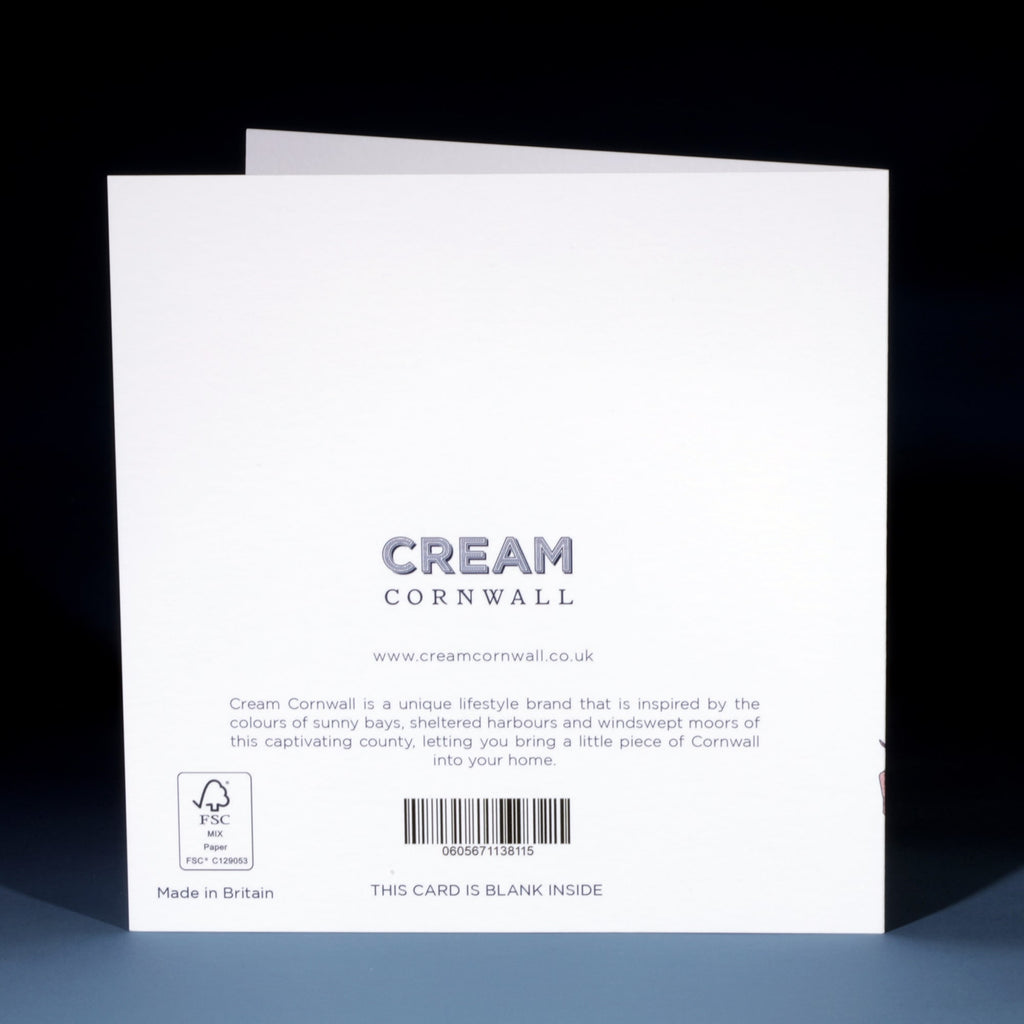 Back of a Cream Cornwall greeting card. The design includes the Cream Cornwall logo, website (www.creamcornwall.co.uk), and a description of the brand’s inspiration from Cornwall’s coastal and countryside landscapes. A barcode is centered at the bottom with FSC certification and "Made in Britain" indicated. The text notes the card is blank inside.