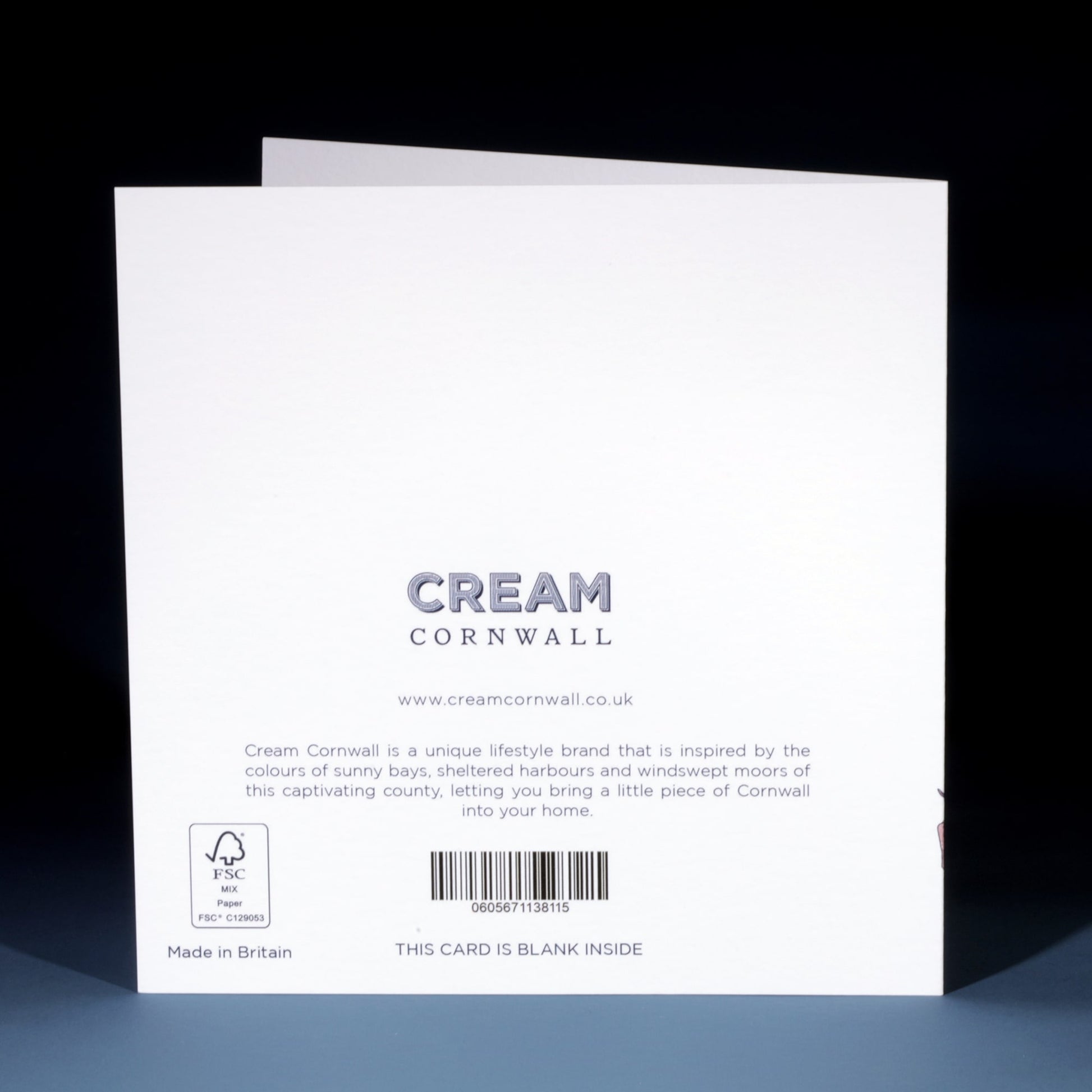 Back of a Cream Cornwall greeting card displaying the brand's logo, website (www.creamcornwall.co.uk), product description, barcode, and FSC certification. The text highlights the inspiration from Cornwall's landscapes and notes that the card is blank inside.