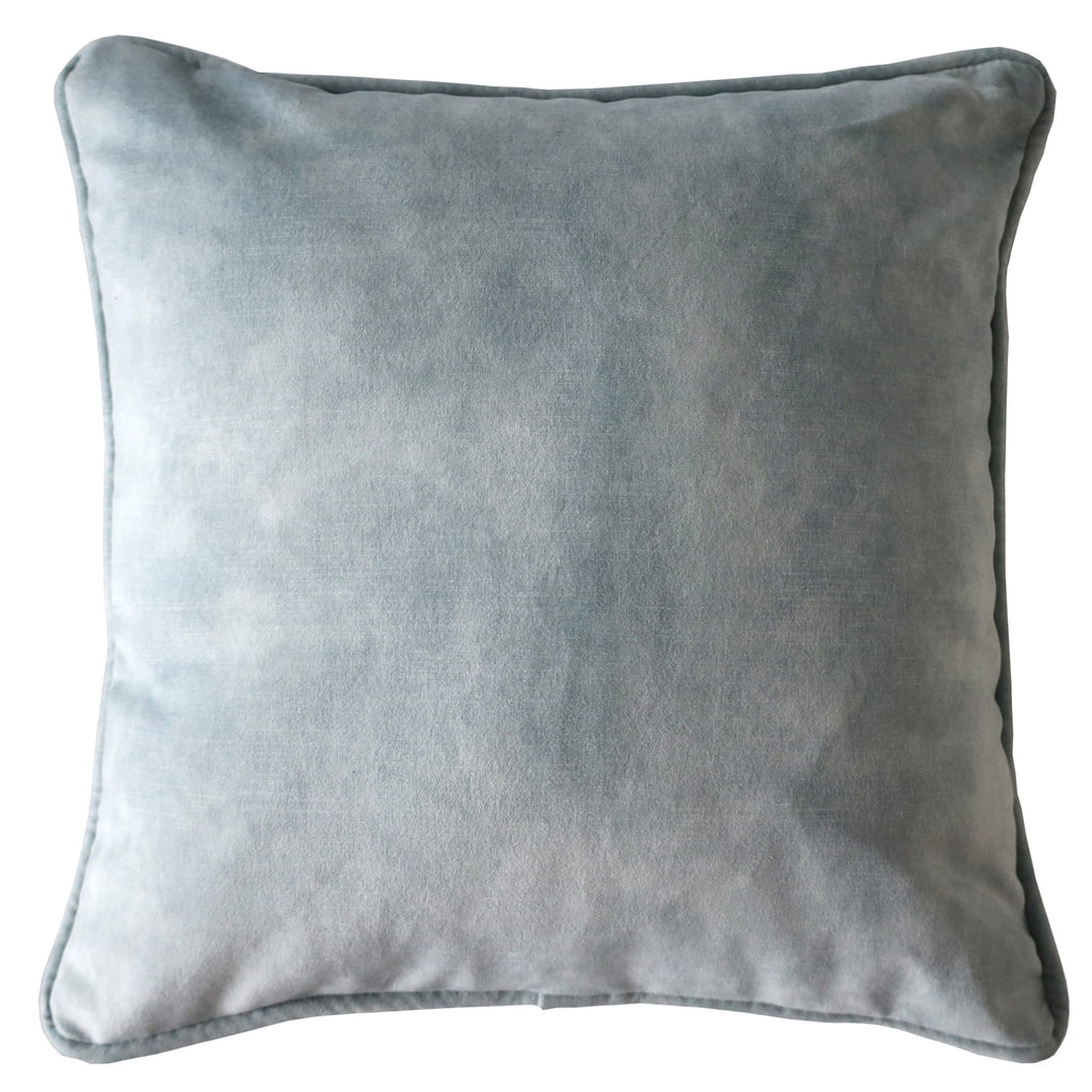 Shallows velvet cushion on a white background.