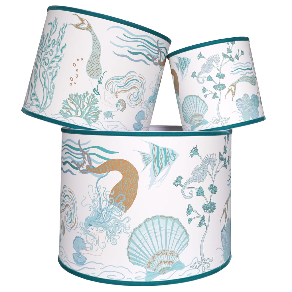 Cream Cornwall Mermaid lampshades in three sizes, featuring an elegant coastal design with mermaids, seahorses, shells and seaweed in soft blue and turquoise tones.
