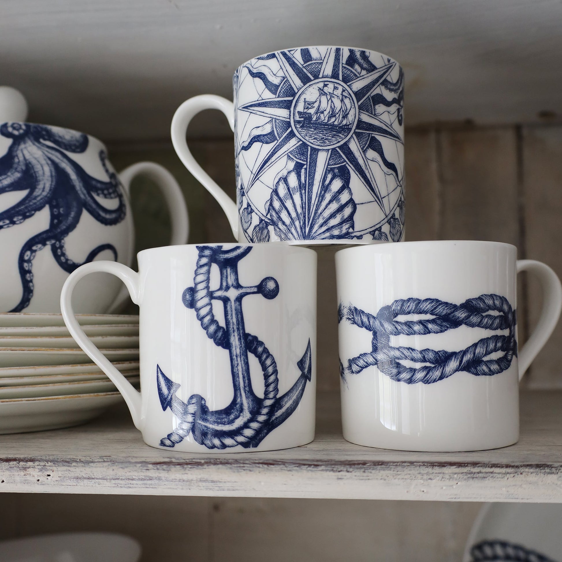 Stack of three mugs Anchor,reef Knot and a Compass Mug.