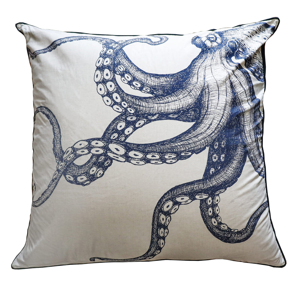 Pillow with blue octopus design on a white background