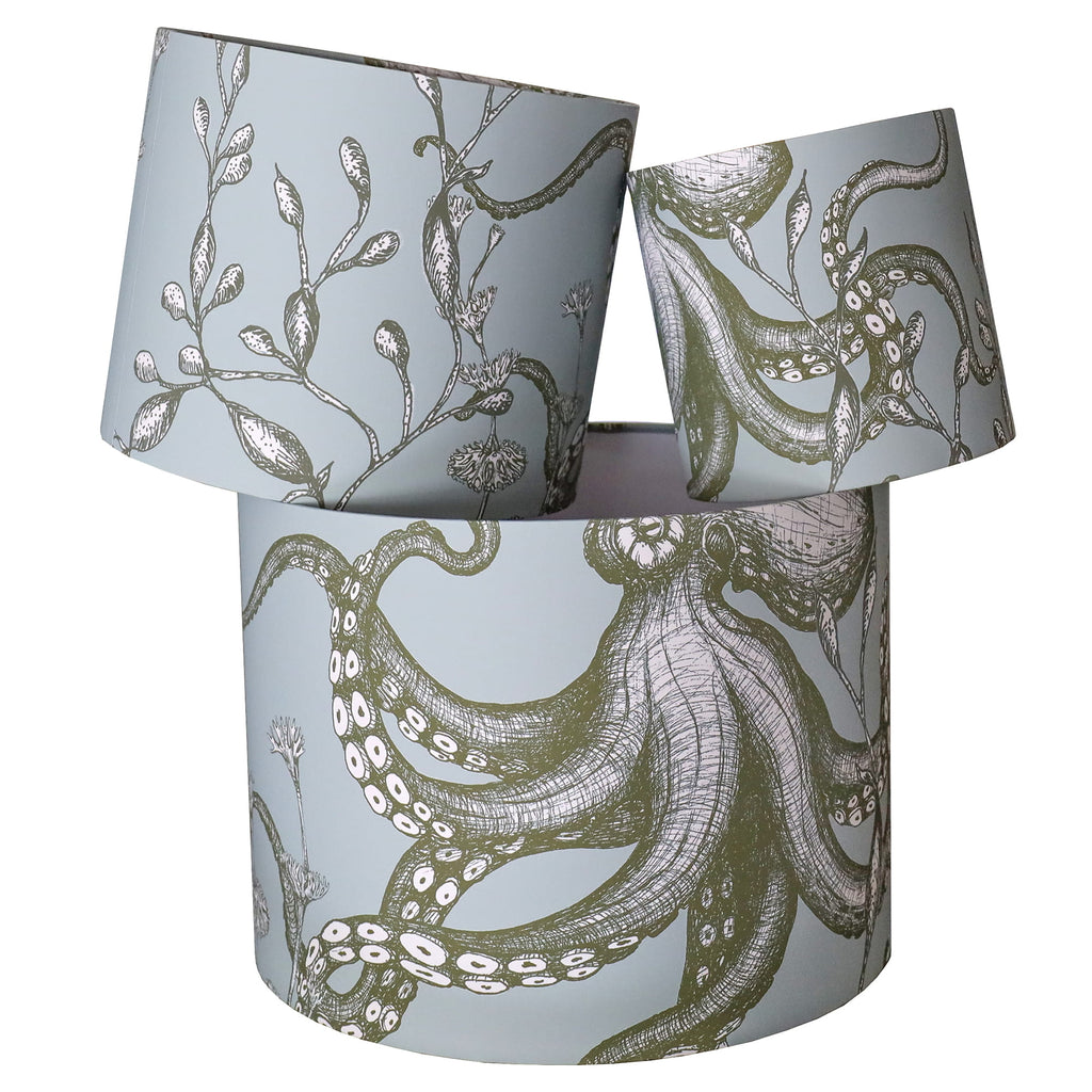 Decorative lampshades with octopus design on a light blue background