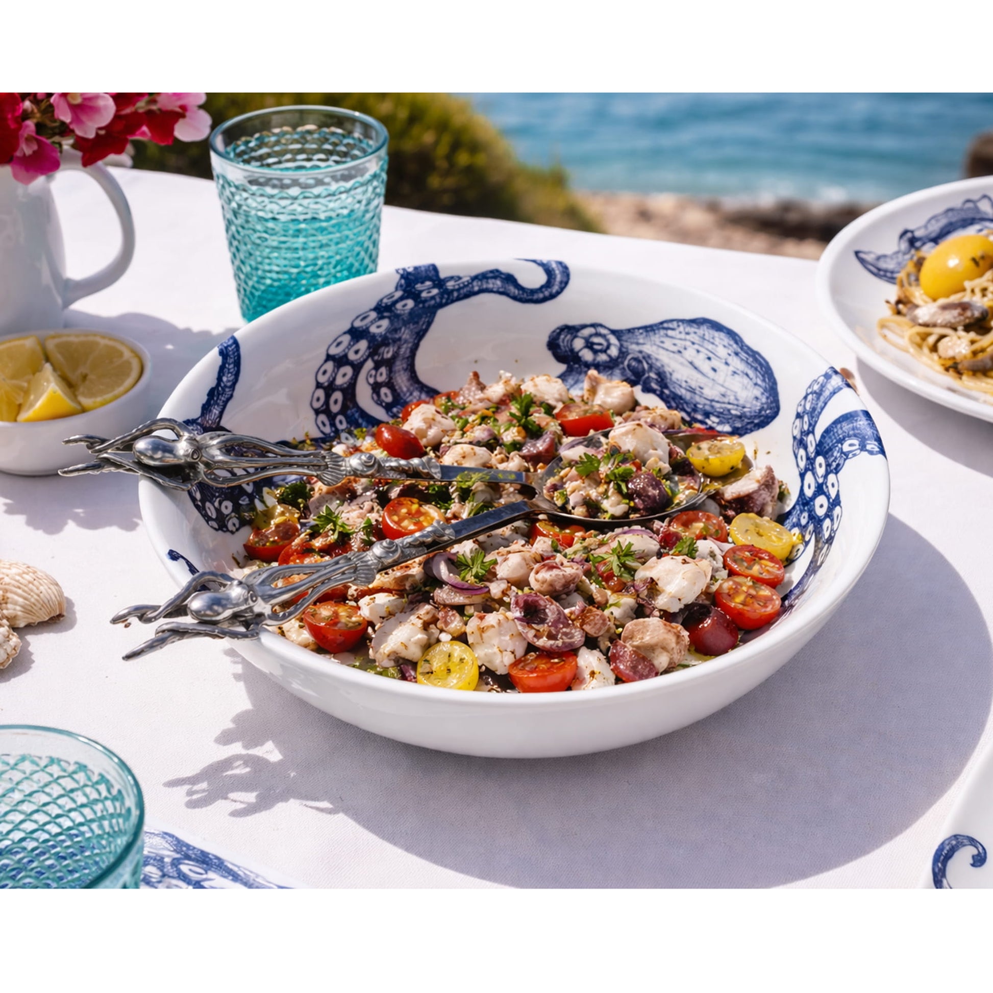 Colourful salad in a decorative bowl with octopus design, on a table with a scenic background