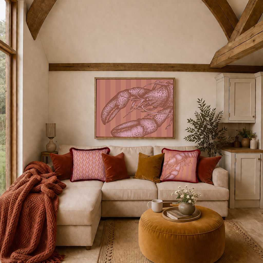 Cozy living room with a beige sectional sofa, colorful pillows, and a pink lobster artwork on the wall.