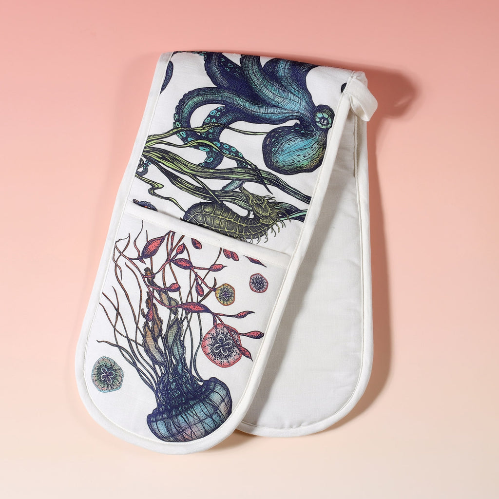 Cotton and linen mix oven gloves with hand drawn illustrations of coloured reef print of Jellyfish,seahorses,starfish and Octopus  