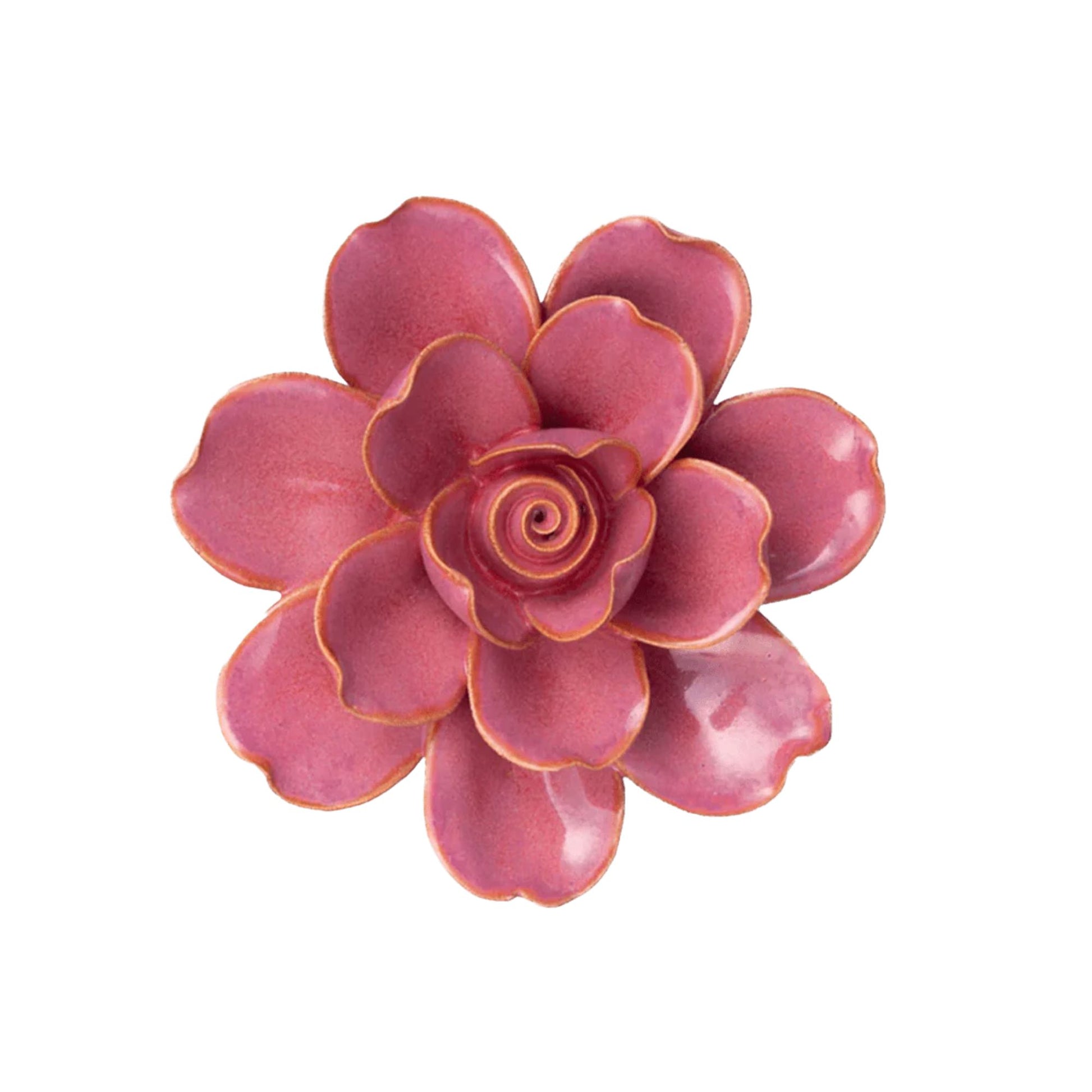 Pink ceramic flower on a white background