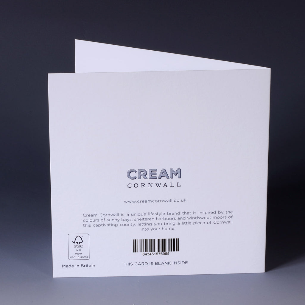 back of greeting card with navy illustration of a scallop shell on a white background