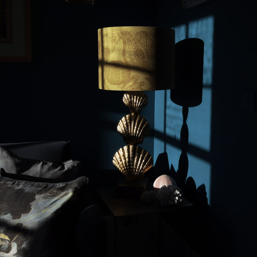 Decorative lamp with intricate design on a dark background