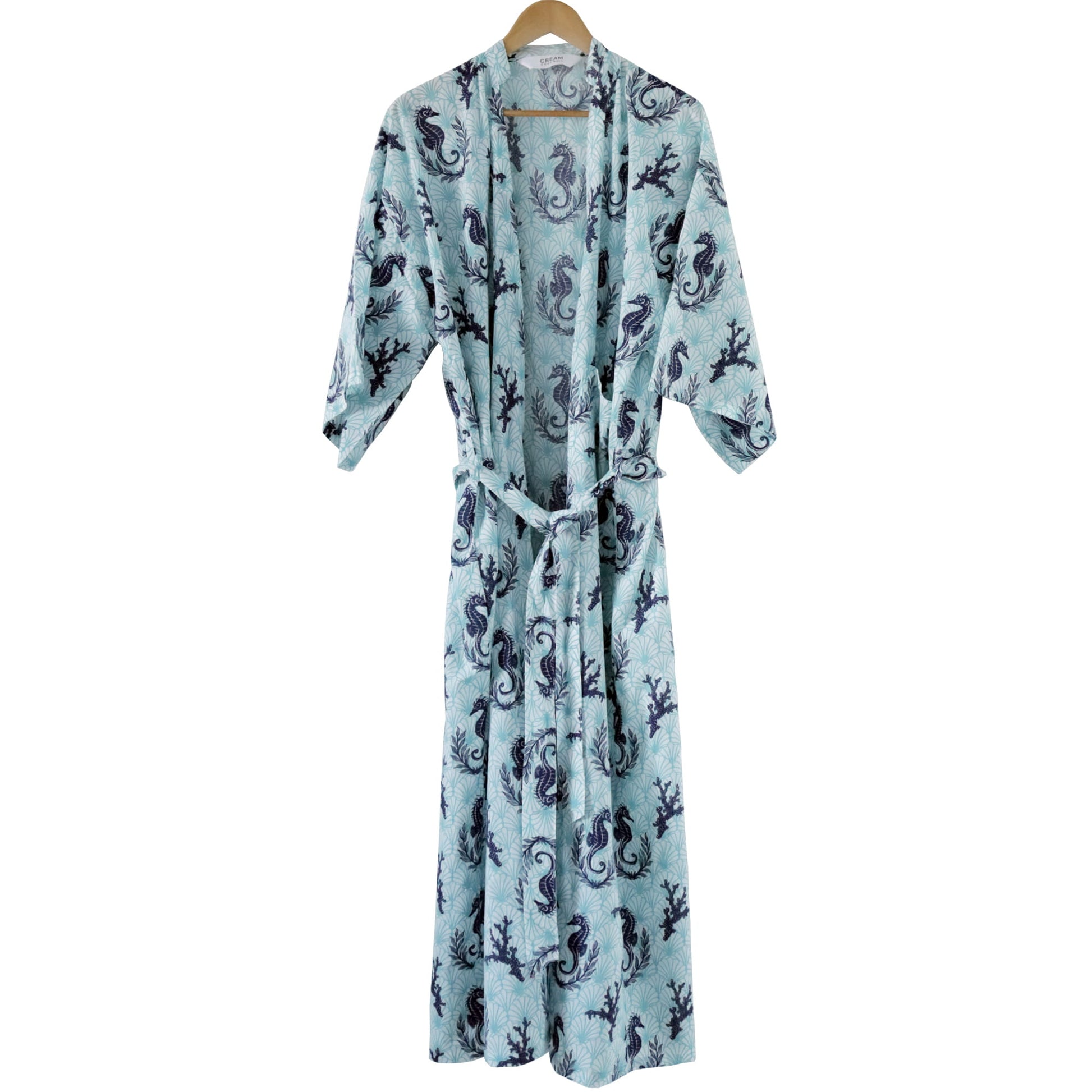 Light blue robe with black patterns on a white background
