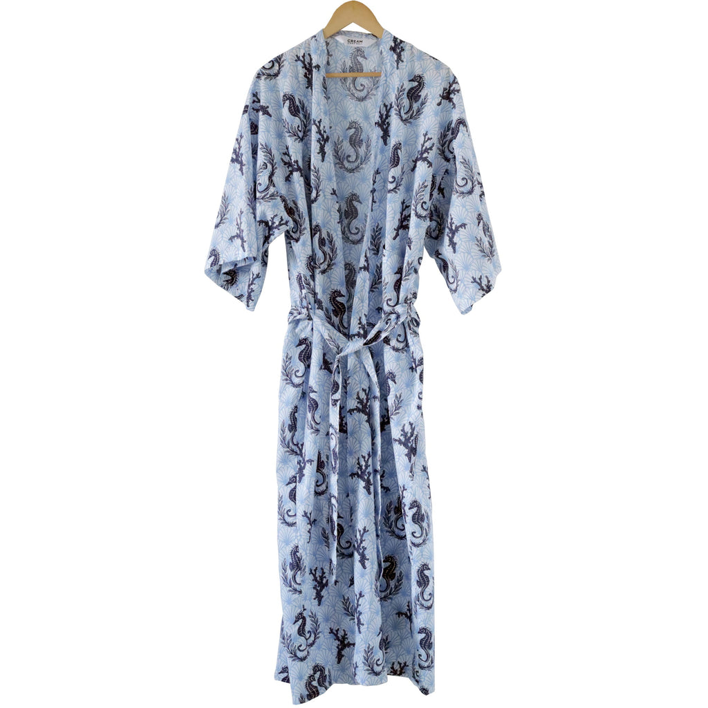 Blue patterned robe on a hanger against a white background