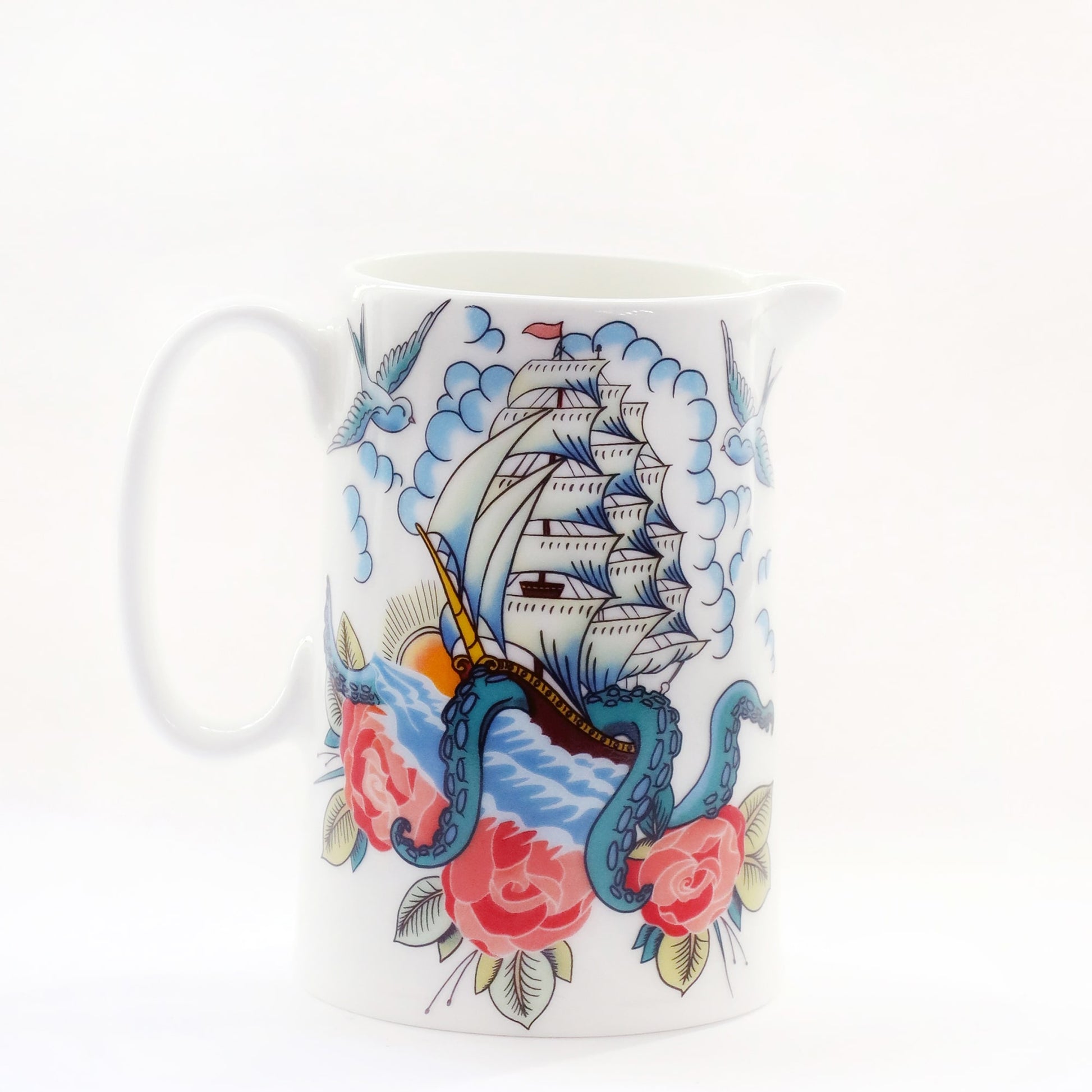 Product shot of a white jug with a ship, kraken and roses design that is inspired by sailor's tattoos.