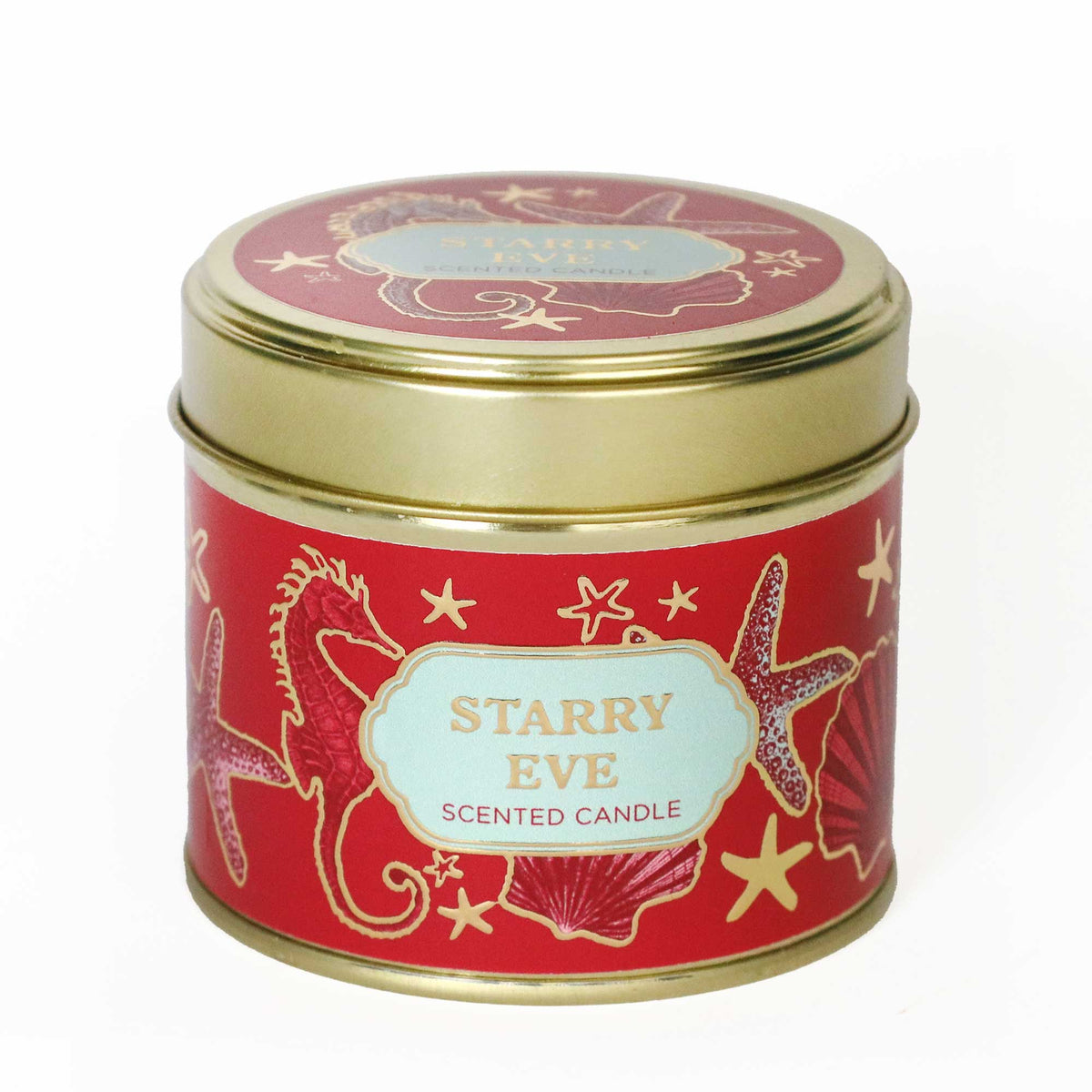 
Starry Eve scented candle in a gold metal tin with a vibrant red label featuring gold seahorse, starfish and seashell illustrations, and a pale blue central label, photographed against a clean white background.