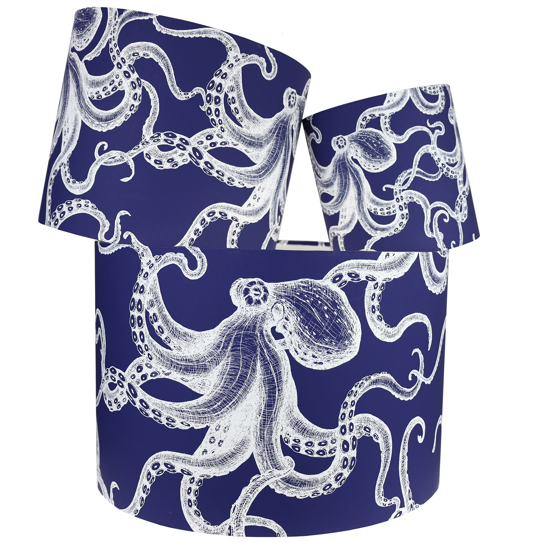 Our Classic Octopus White design on a Navy background.The lampshades are shown in a stack of three showing all three sizes.