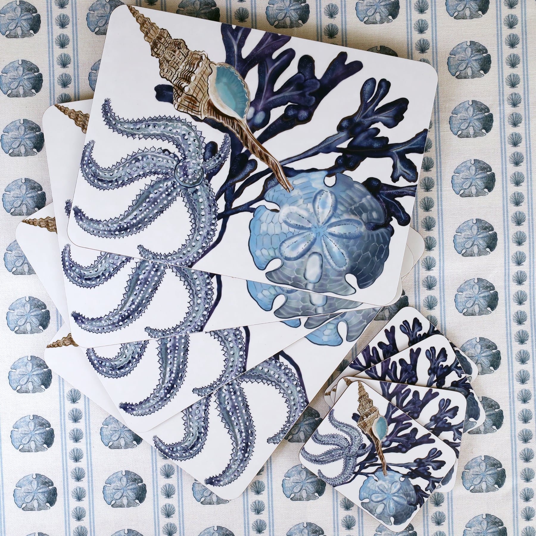 Tablecloth in the sand dollar with Placemats and Coasters in our Beachcomber design