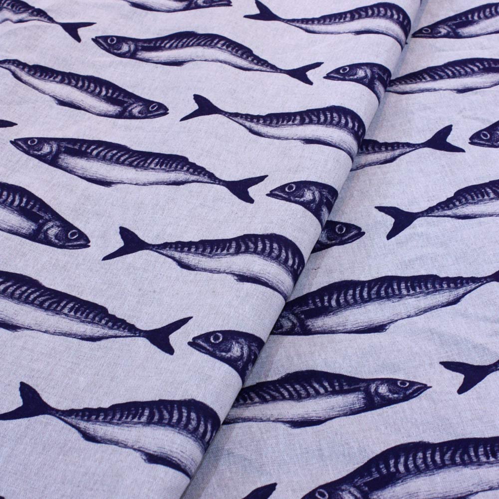 Close-up view of a fabric featuring a repeating pattern of navy blue mackerel fish on an ecru background. The fish are illustrated in a realistic style and arranged in alternating rows, creating a bold and nautical-themed textile design.