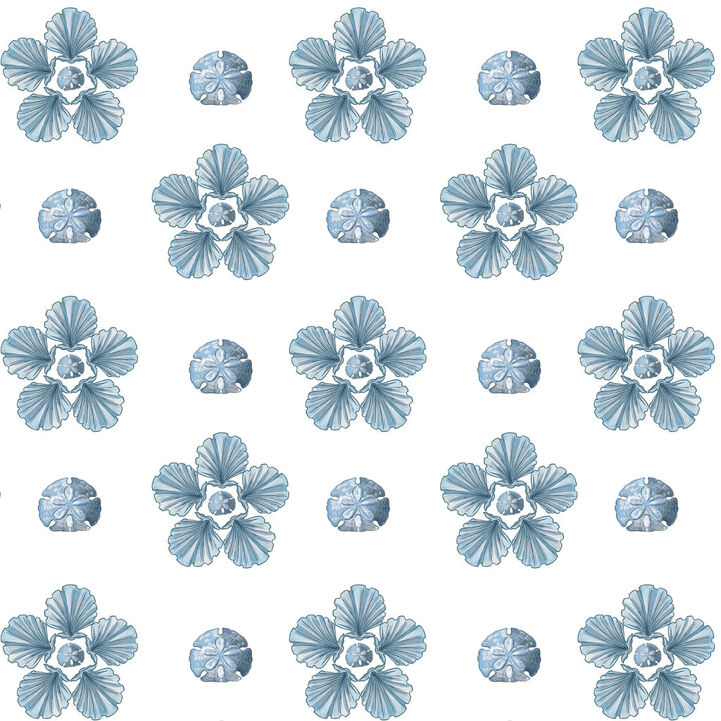 A repeating pattern featuring alternating motifs of stylized blue sand dollars and floral shapes composed of scallop shells arranged in a circular formation, all set against a crisp white background. The design has a delicate coastal aesthetic.