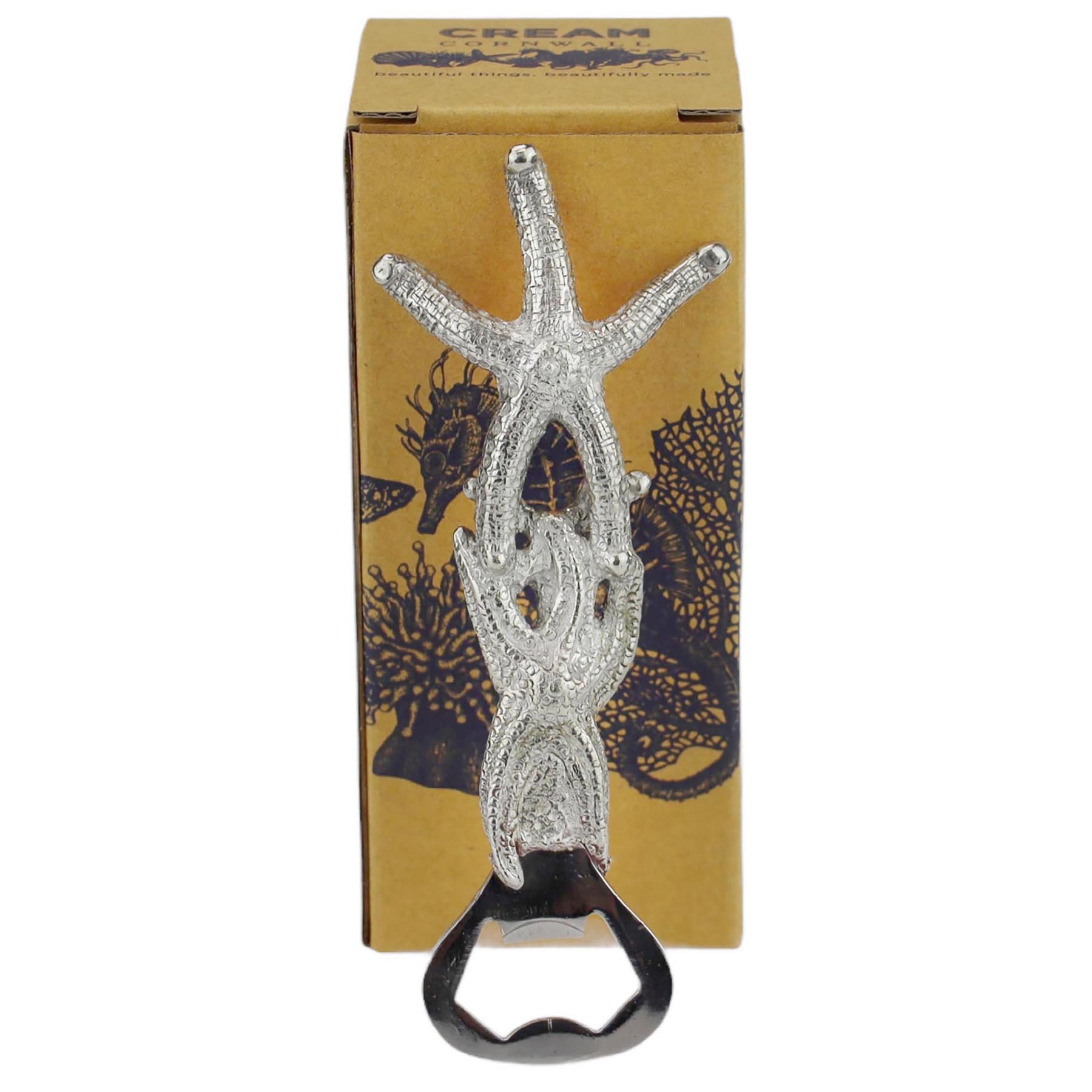 Pewter Starfish Bottle Opener in front of a cream cornwall box